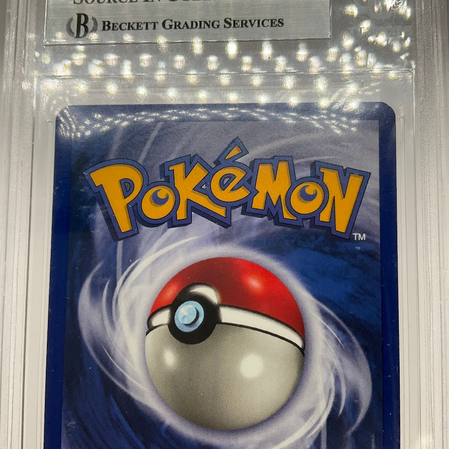 Dragonite Pokemon Fossil Holo #4 Beckett 8