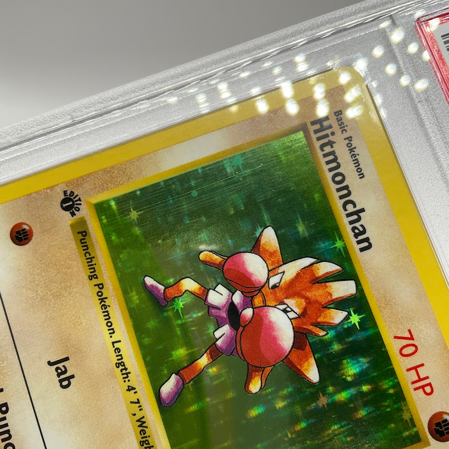 Hitmonchan Pokemon Base Set Holo 1st Edition #7 PSA 8