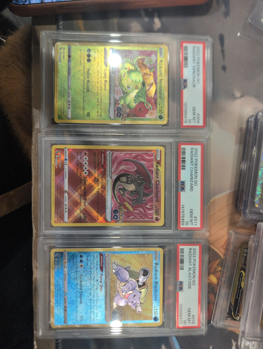 Pokemon: PSA 10 Radiant Charizard, Blastoise & Venusaur Pokemon GO Trio